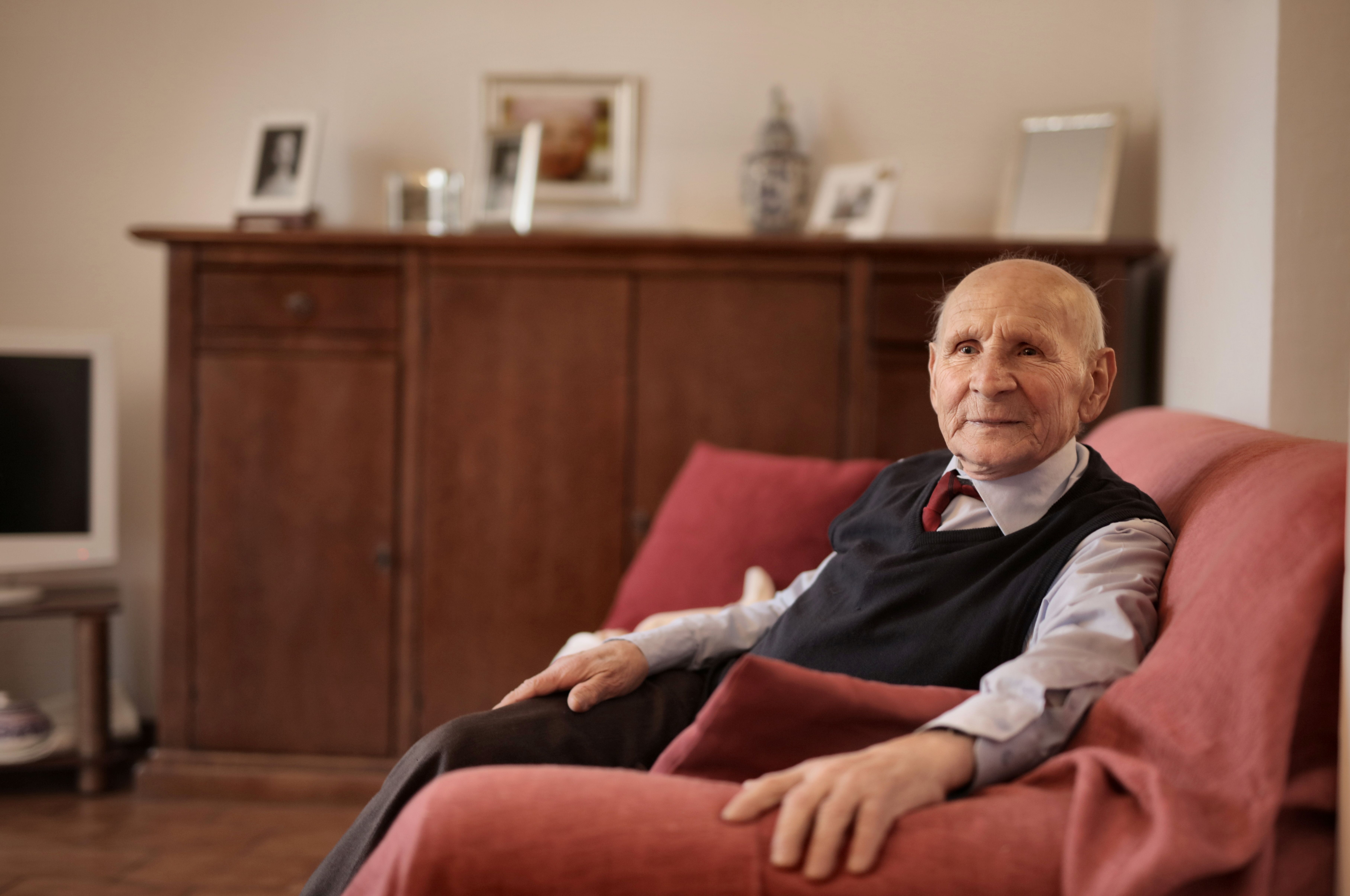 Elderly person relaxed at home